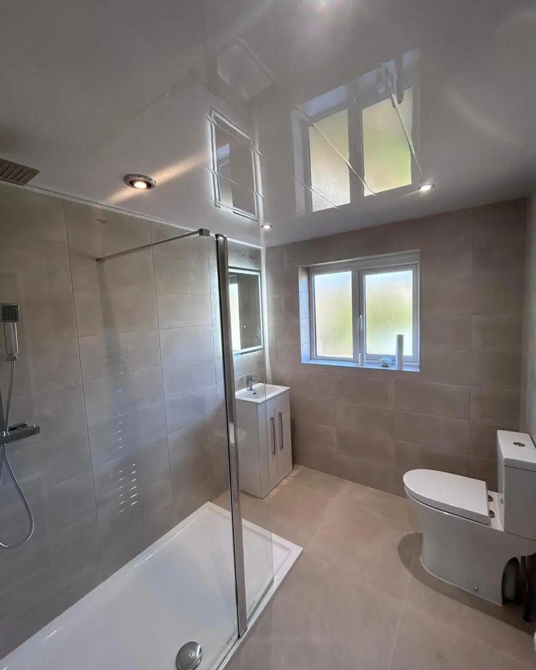 Neutral bathroom renovation with walk-in shower fitted by Heat365 in Sheffield