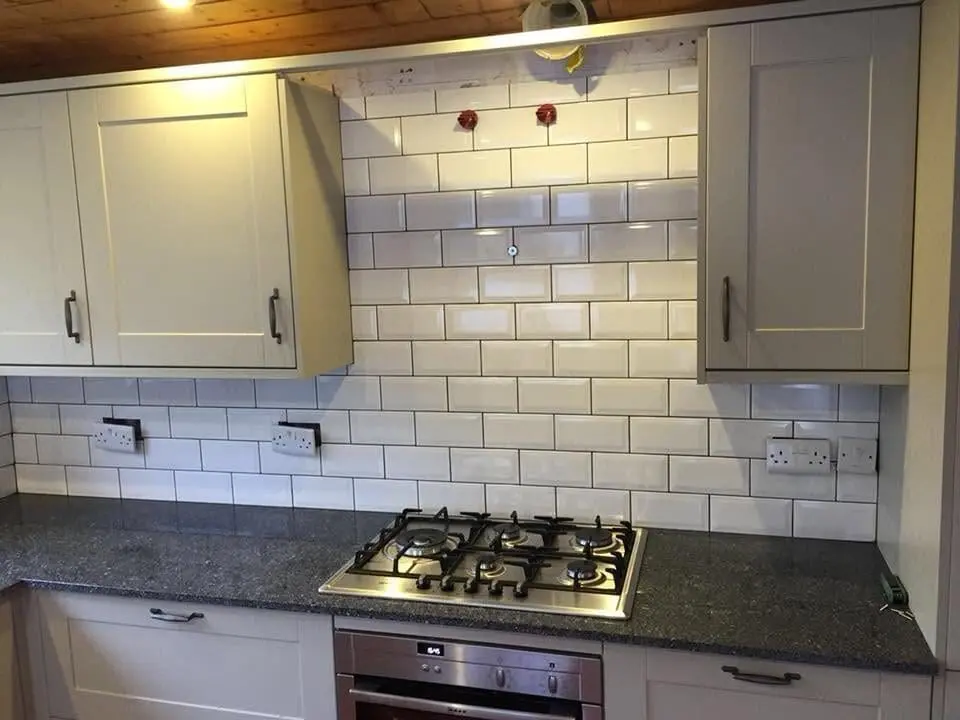 Grey shaker kitchen with metro splashback and granite worktop in Sheffield by Heat365