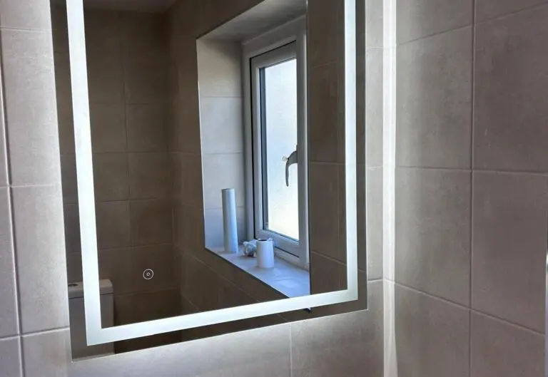 Illuminated LED mirror and basin fitted by Heat365 in a Sheffield bathroom