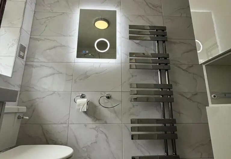 Toilet and heated towel rail fitted by Heat365 in a Sheffield bathroom
