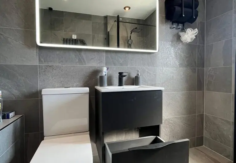 Wall-hung vanity unit and mirror fitted by Heat365 in a Sheffield bathroom