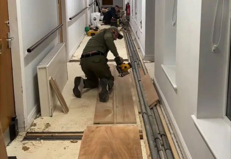 Heat365 engineers installing pipework and flooring at a commercial premises in Sheffield