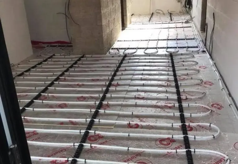 Wet underfloor heating pipe loops laid by Heat365 before the screed goes down in Sheffield