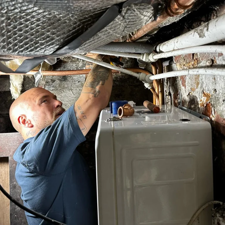 Sheffield Emergency Plumbers - Heat 365 - Ricky working on pipes